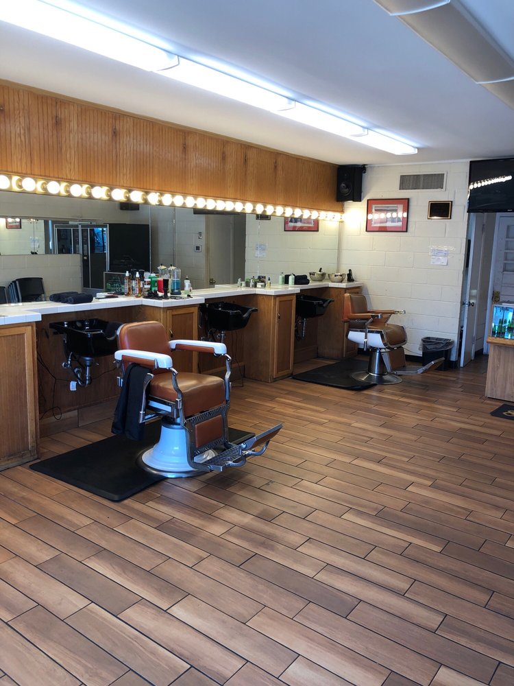 Vintage barber chairs inside Choppers Barbershop
